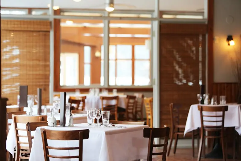 Restaurant outdoor dining area with canvas awning shade in Singapore